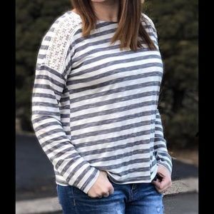 Striped long sleeve shirt with shoulder designs